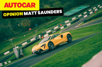 McLaren Artura on track at Cadwell Park jumping over crest